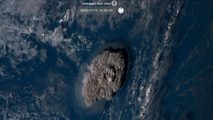This satellite image taken by the Himawari-8, a Japanese weather satellite operated by the Japan Meteorological Agency and released by the National Institute of Information and Communications Technology (NICT), shows an undersea volcano eruption at the Pacific nation of Tonga on January 15, 2022.